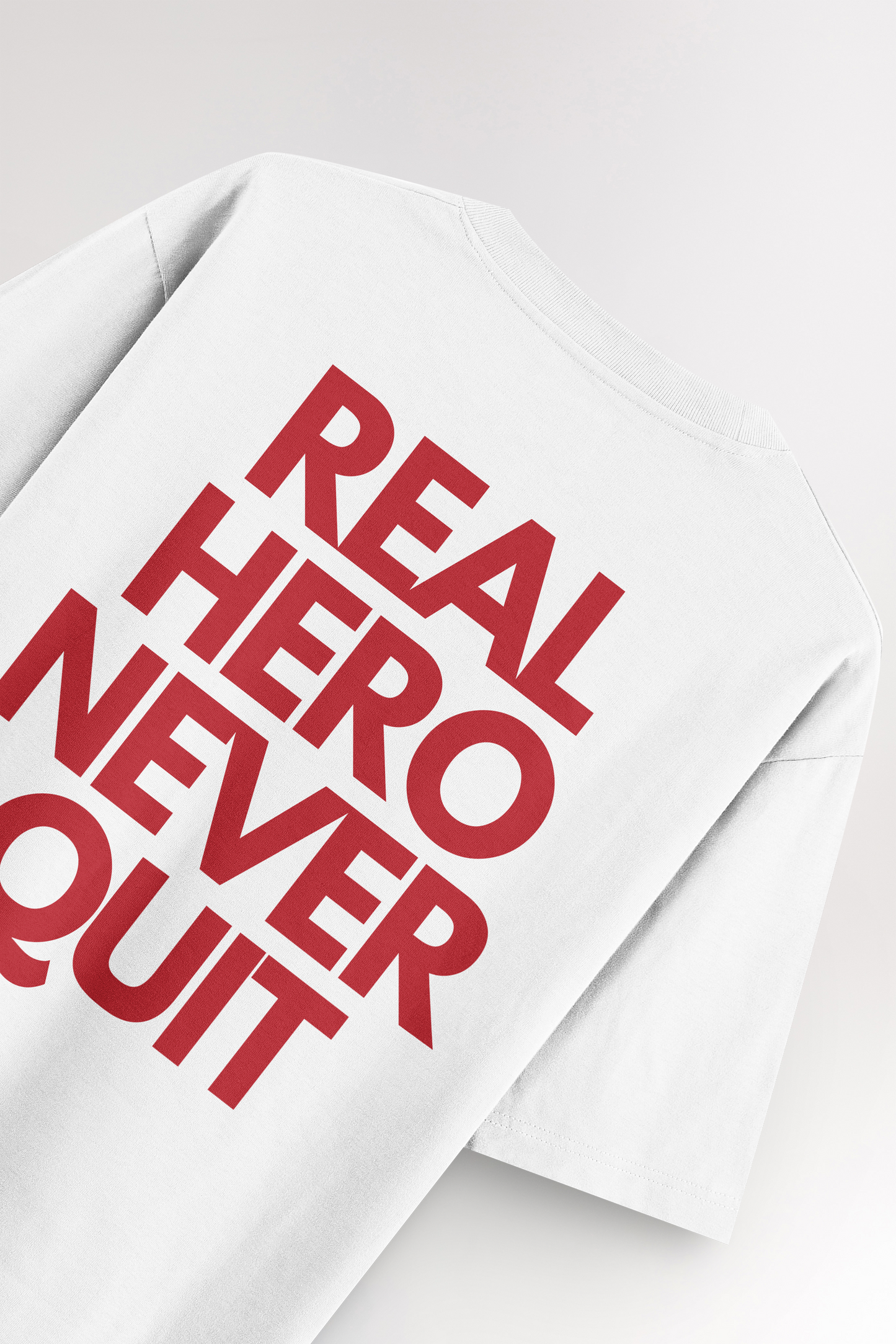 Real hero never quit | Oversized T-shirt